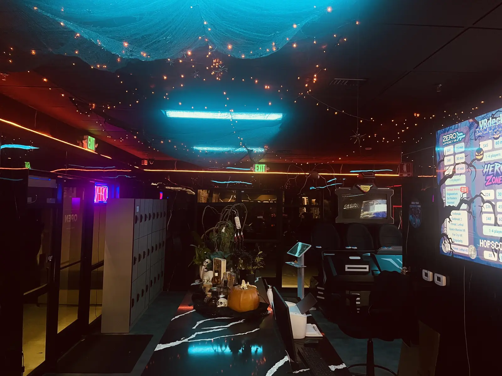 Cobweb canopies and string lights over the Nexus free-roam VR area